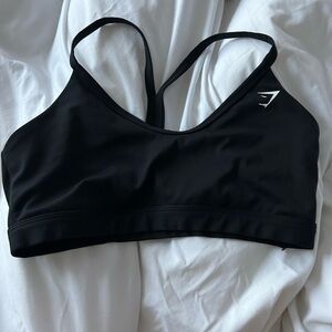 Gymshark v neck sports bra in black.